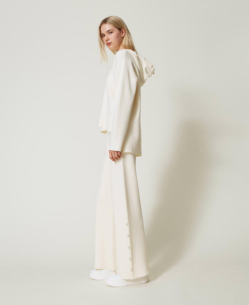 Scee by twin set Pantaloni wide leg in maglia con perle Novità