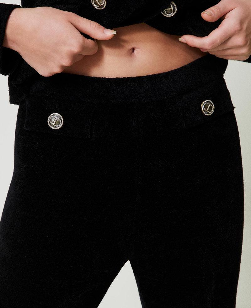 Scee by twin set Pantaloni flare in maglia con bottoni Oval T Offerta settimanale